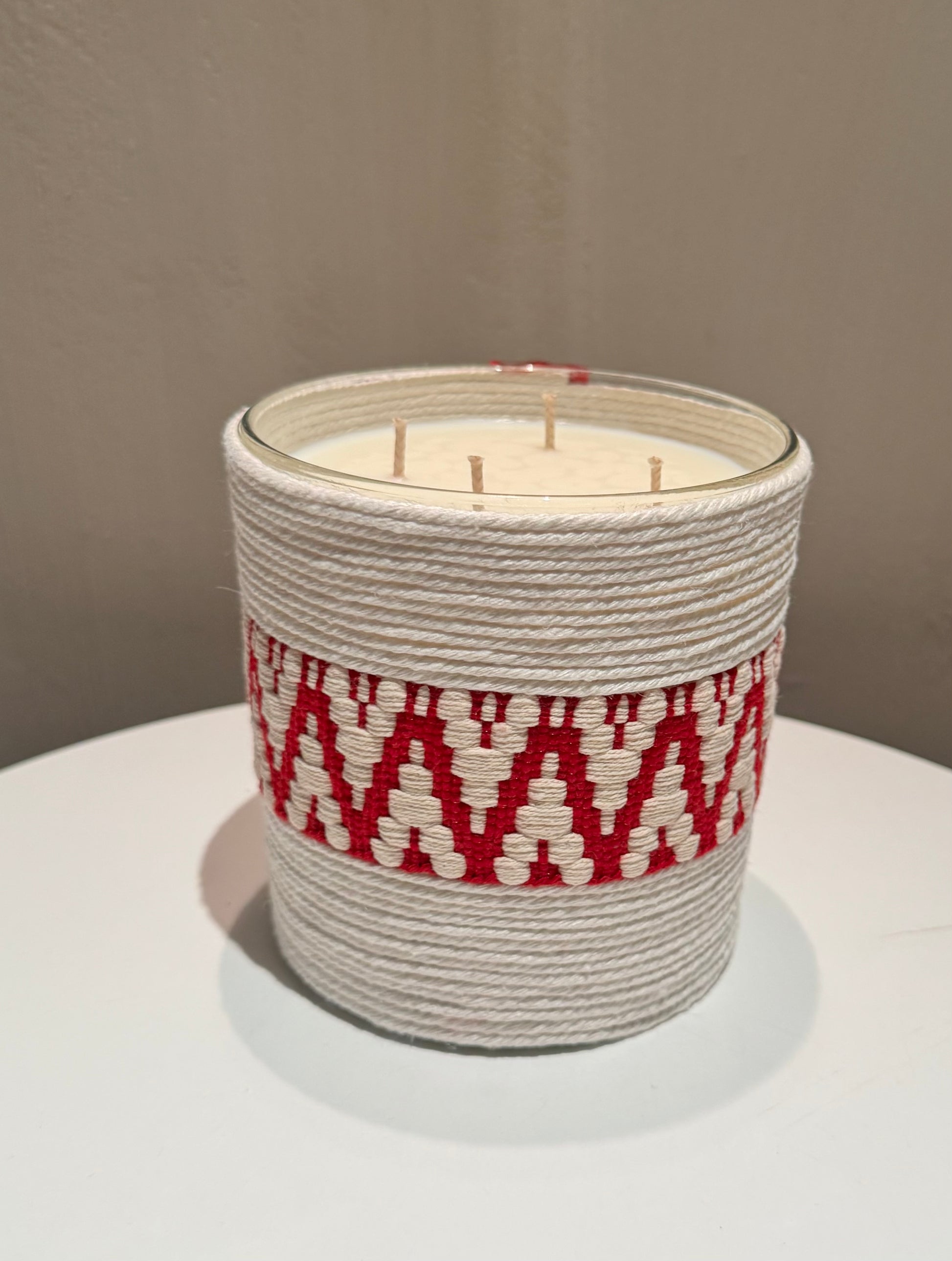White candle with Red zigzag